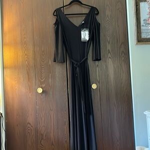 Attitudes black 3/4 exposed shouldered jumpsuit. Size XSTall NWT